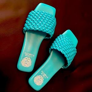 Turquoise Vince Camuto slides.